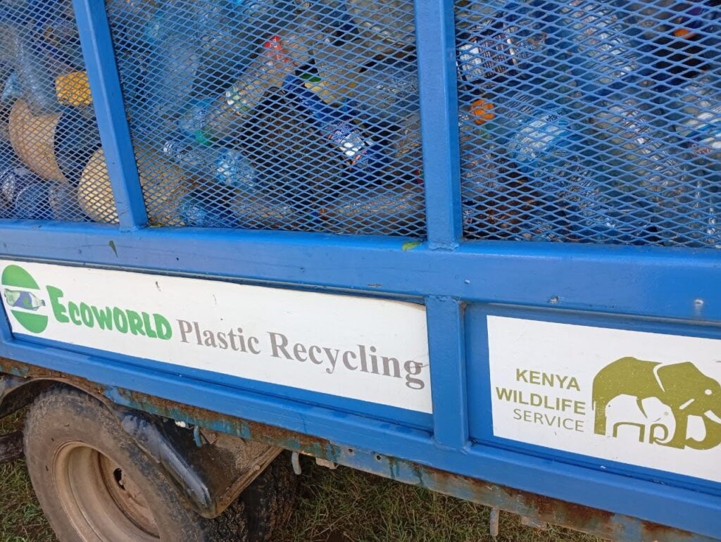 Garbage collection truck with collected plastics to be recycled